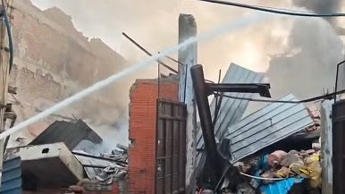 Building collapses after massive fire