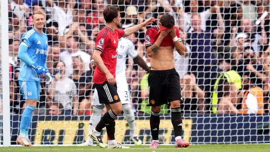 Manchester United's Bruno Fernandes reacts after missing a penalty