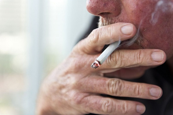 Man black lips, smoker.effects of smoking